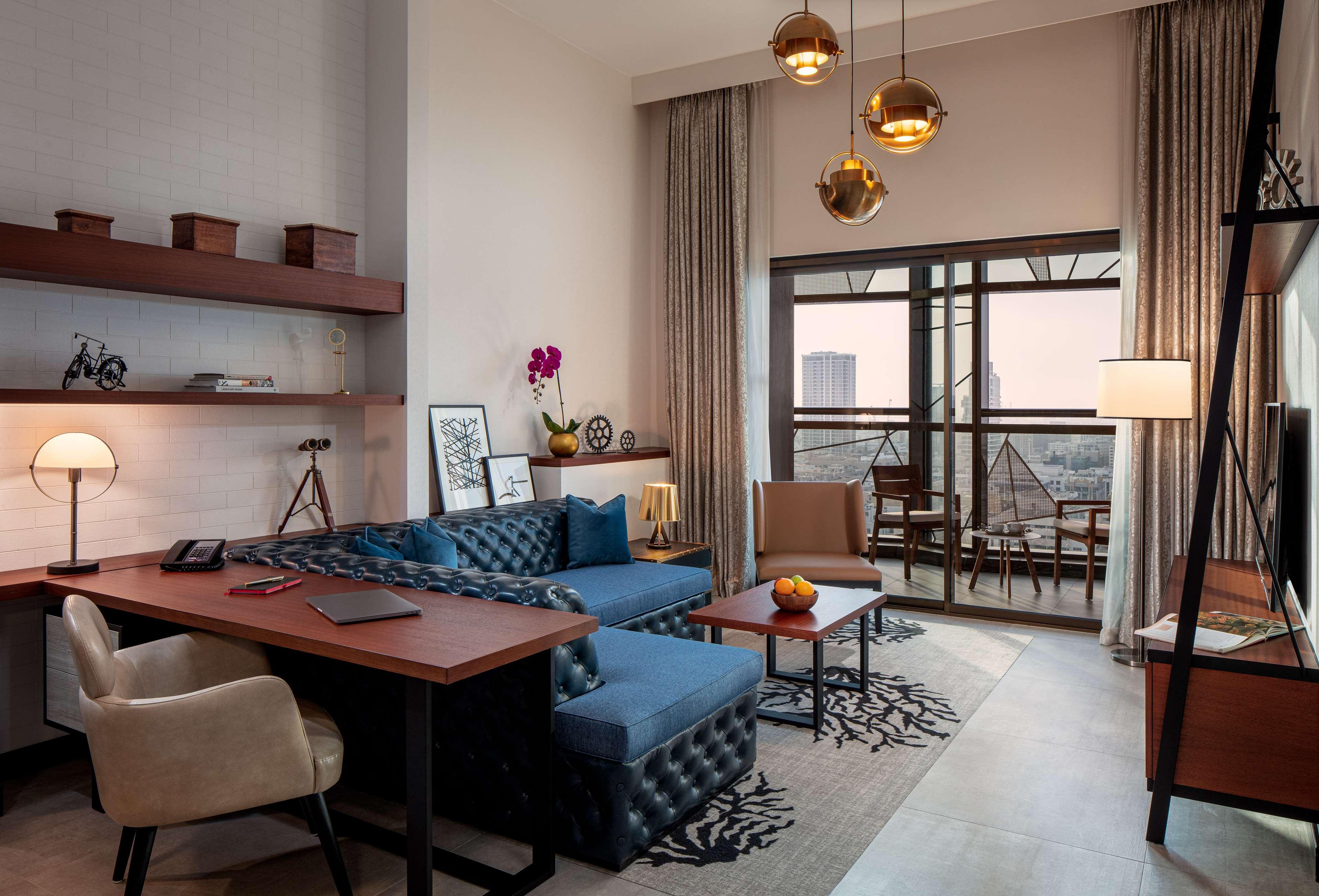 DoubleTree by Hilton Dubai M Square Hotel&Residences Exterior foto A living room at the hotel