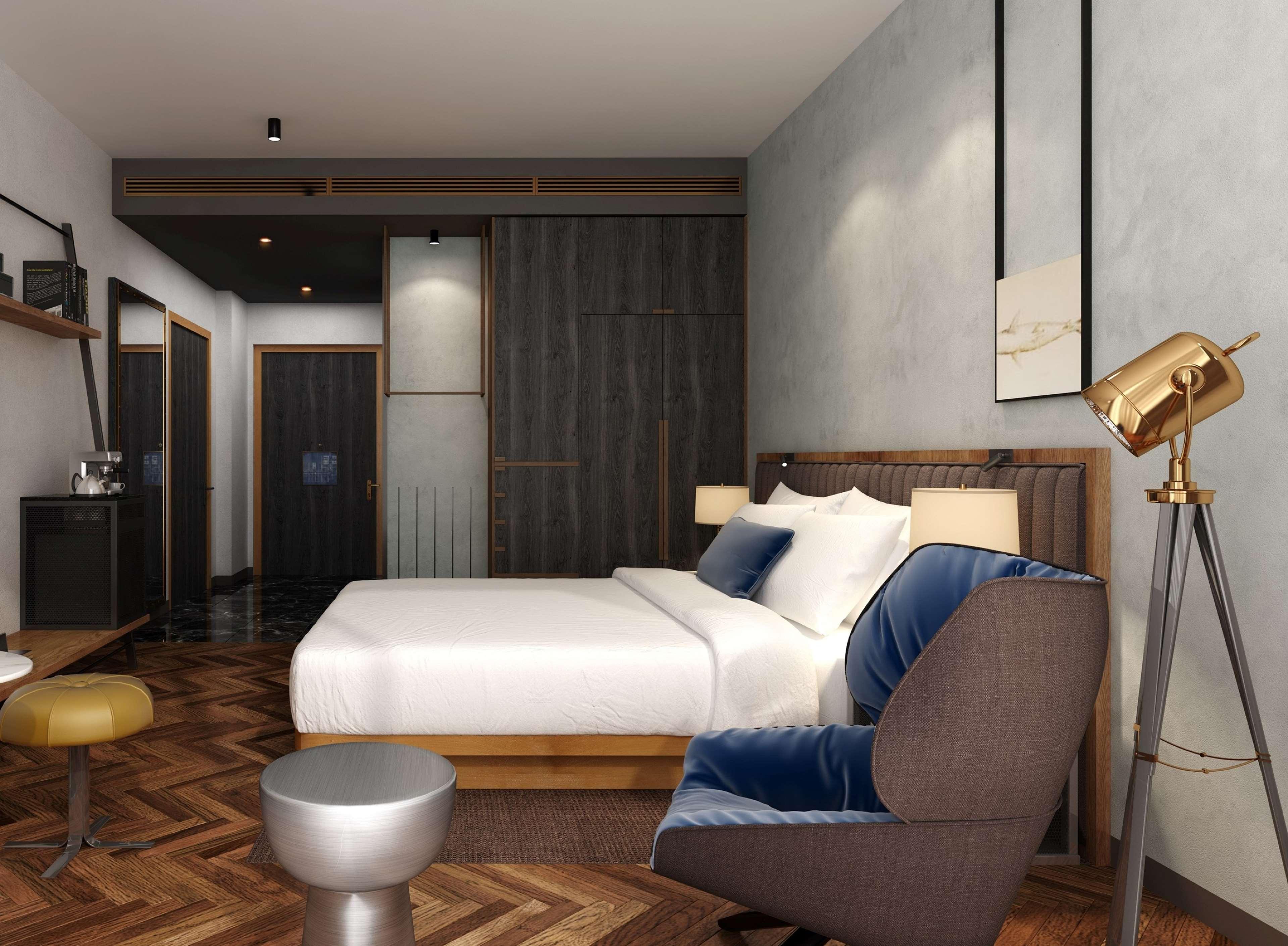 DoubleTree by Hilton Dubai M Square Hotel&Residences Exterior foto A bedroom